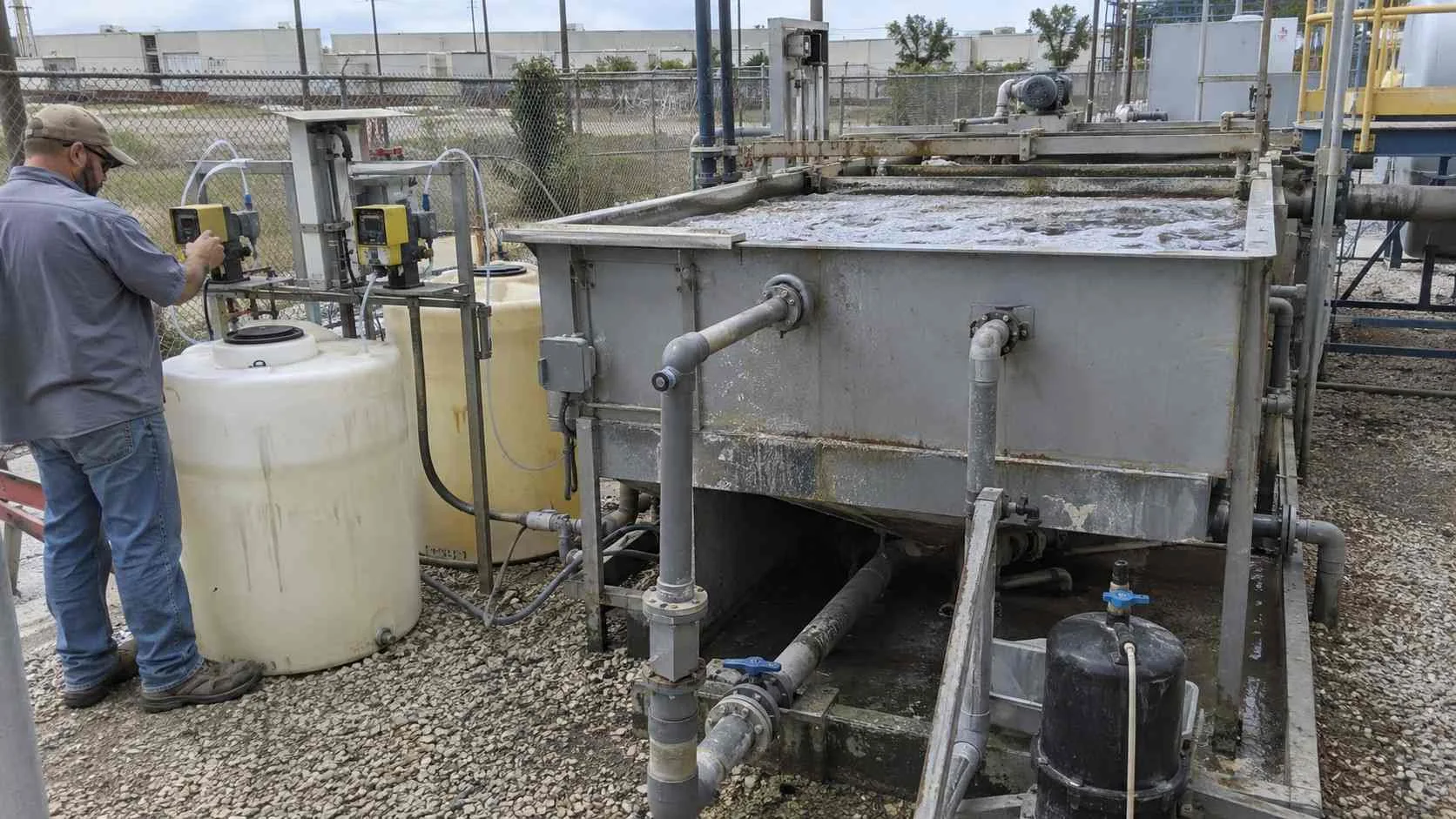 Dissolved air flotation and chemical feed system at an industrial facility