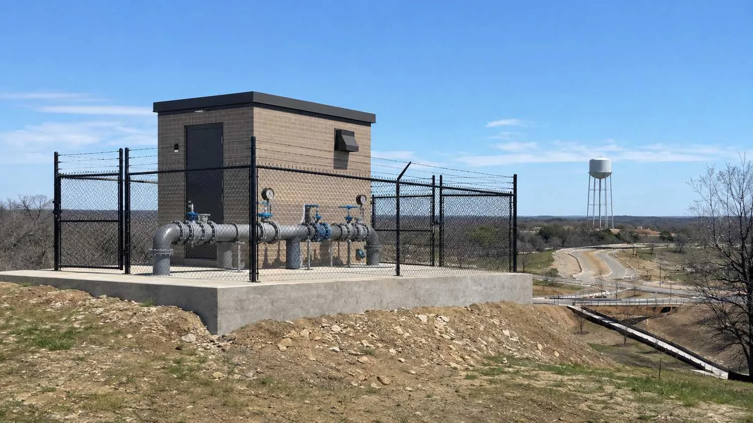 Water booster pump station serving higher elevation area of McKinney development.