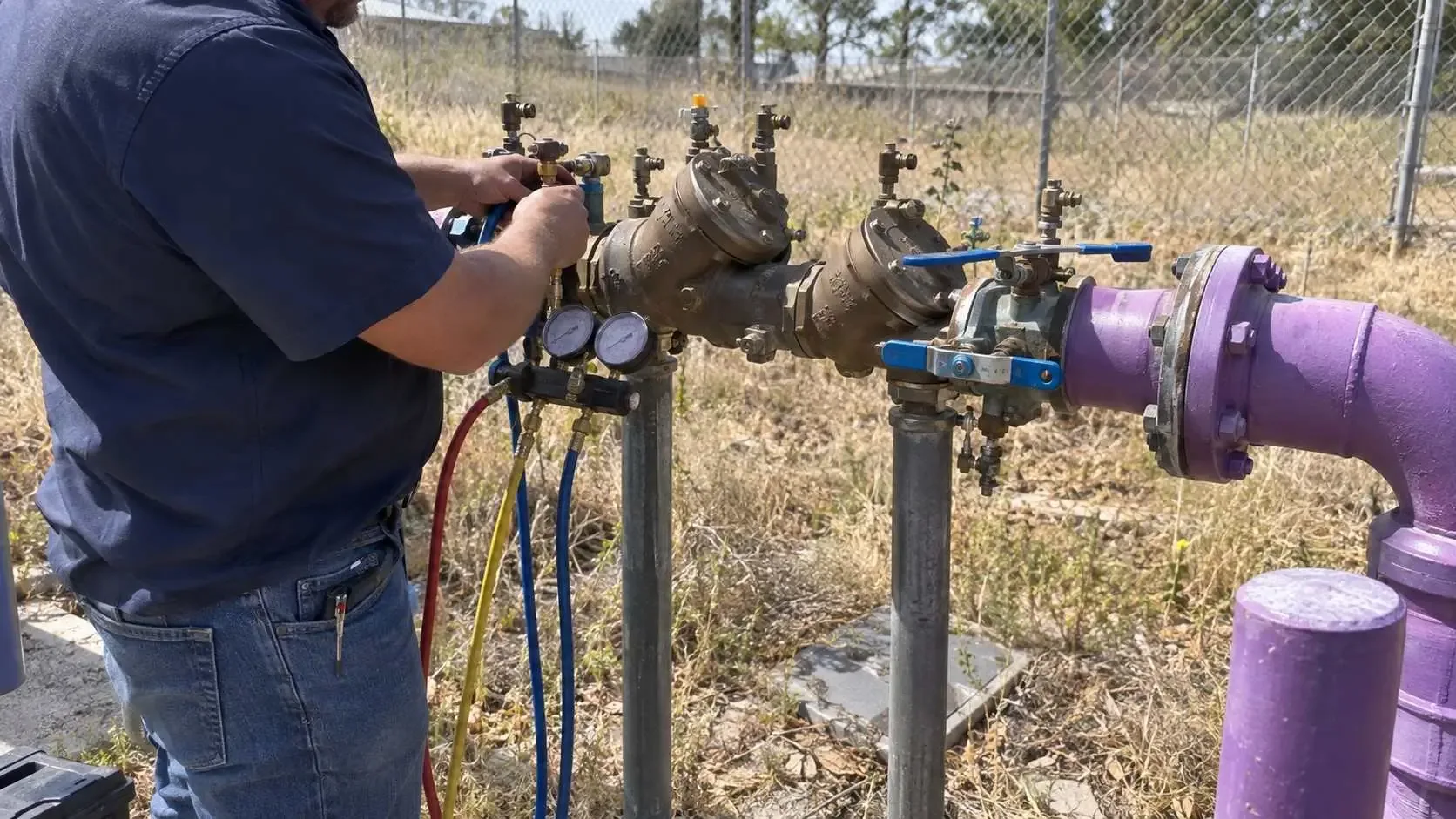 Testing a backflow preventer on a recycled water line