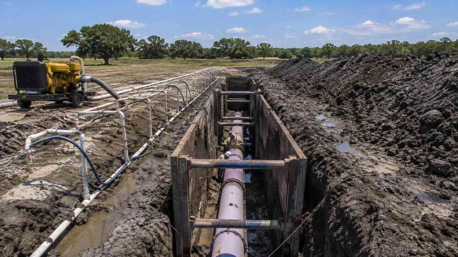 Force main trench dewatering in Houston expansive clay soil.