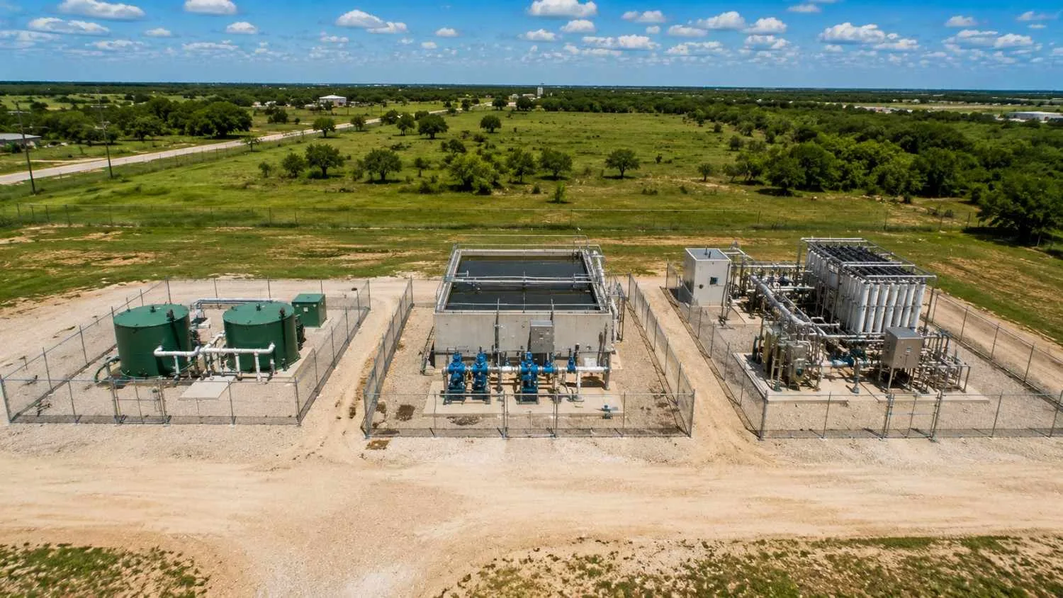 Side-by-side ground-level comparison of three Texas package wastewater treatment process configurations showing a simple extended aeration plant on the left, a sequencing batch reactor in the center and a membrane bioreactor with visible membrane equipment on the right.