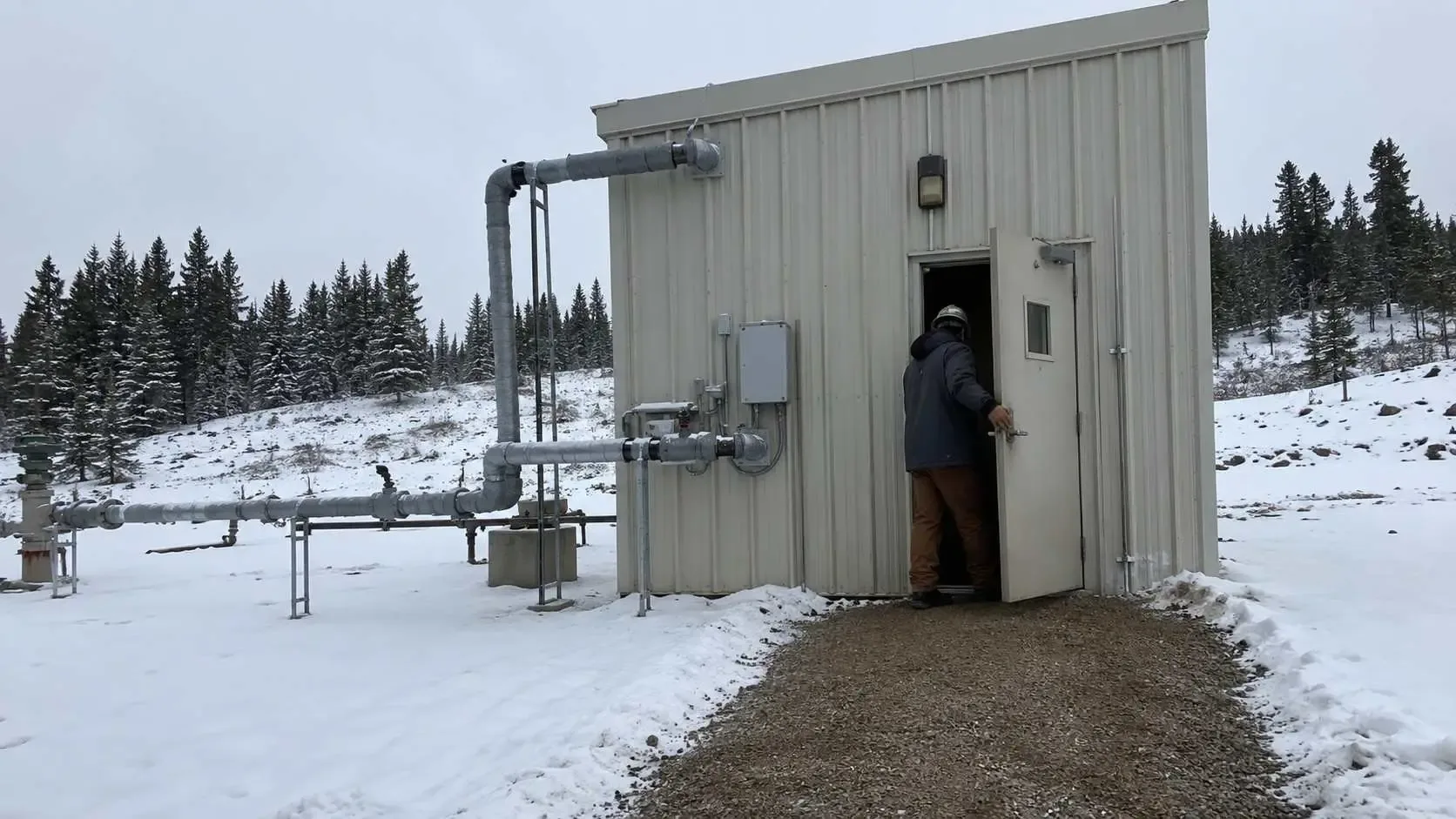 A package plant building enclosure cleared for winter access