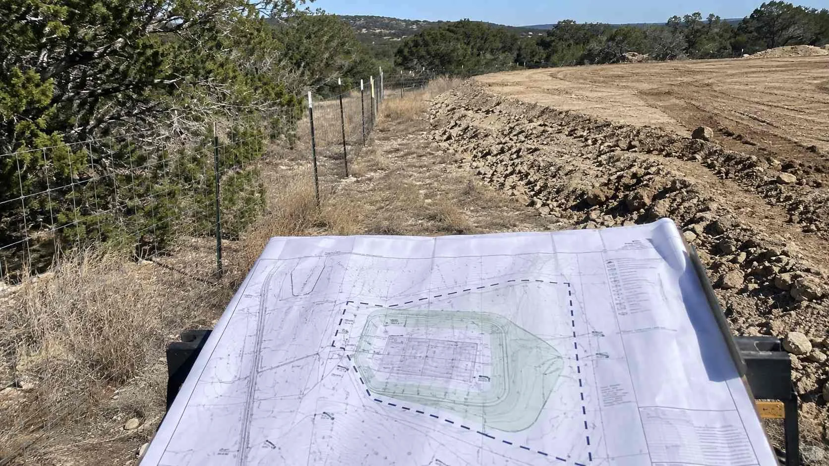 Approved site plan held against a mismatched built condition